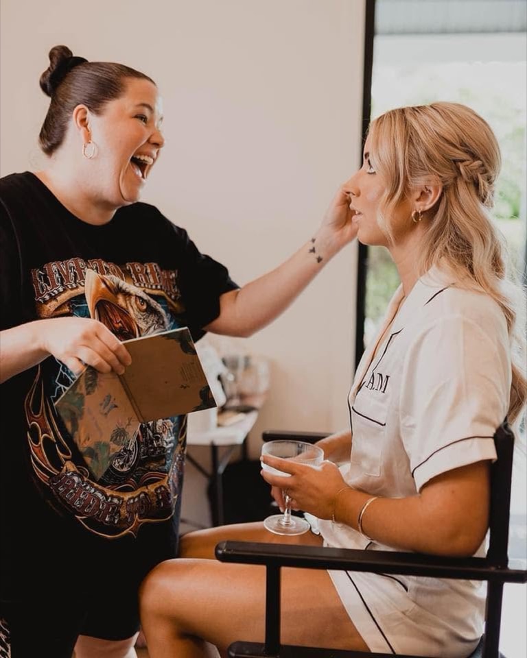 Erin at work, doing a bride's makeup on the wedding morning