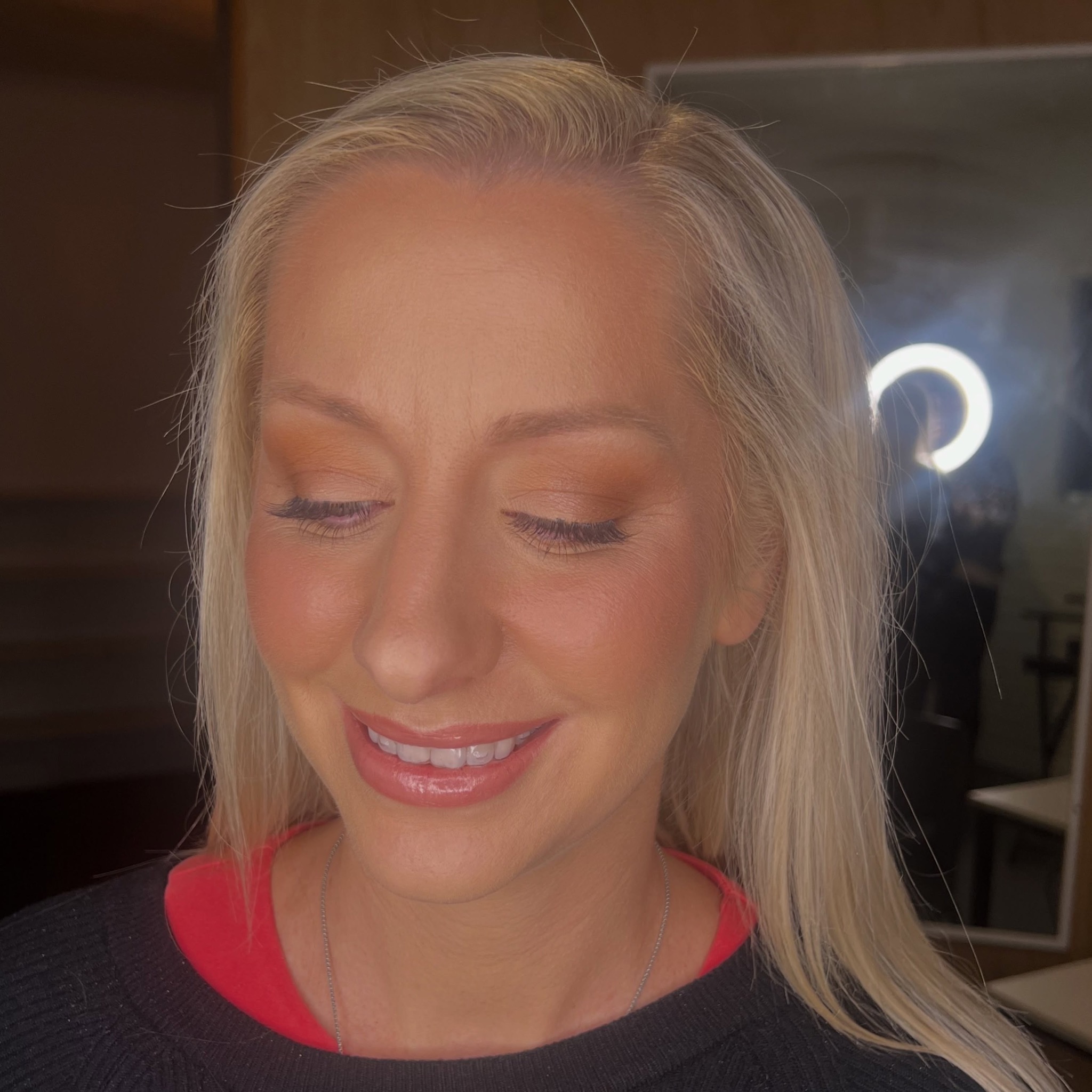 Warm toned eyeshadow on a blonde client